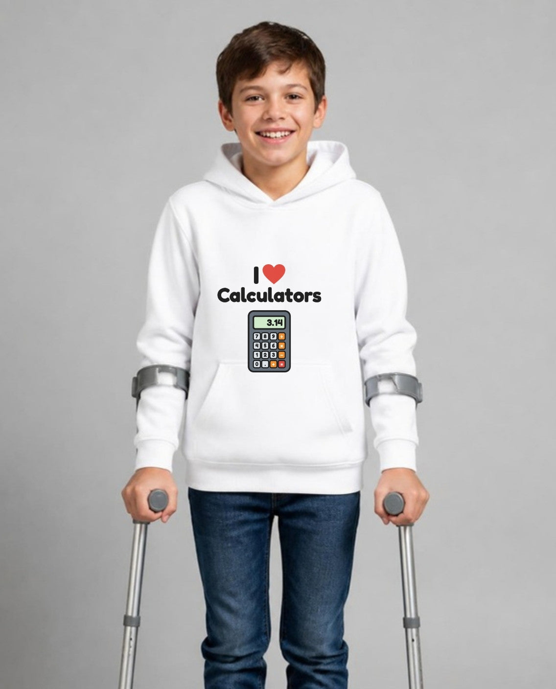 Boy who uses forearm crutches wearing the I Love Calculators Youth Hoodie in White