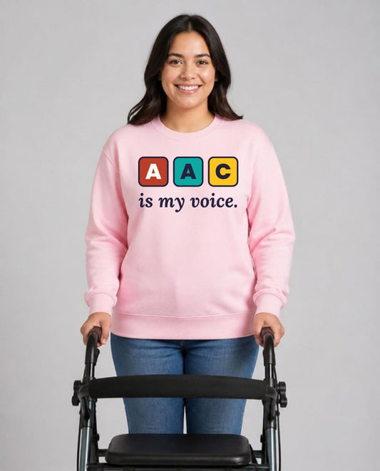 Woman with a rollator walker wearing the AAC Is My Voice Adult Sweatshirt in Light Pink
