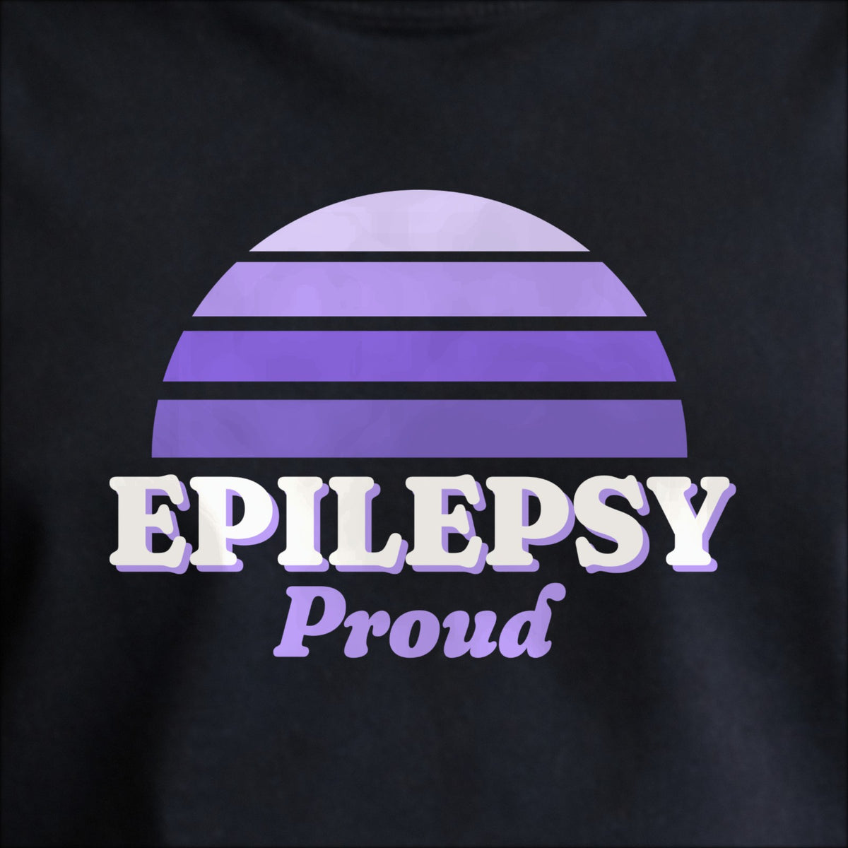 Close-up of the print on black: a striped half-sun in purple above cream EPILEPSY lettering with “Proud” in script.