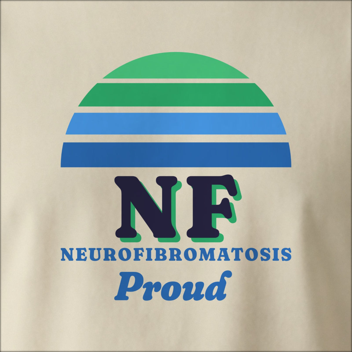 Close-up of the print on a natural tee: a striped half-sun in green and blue above bold NF lettering, NEUROFIBROMATOSIS spelled out underneath, with “Proud” in script.