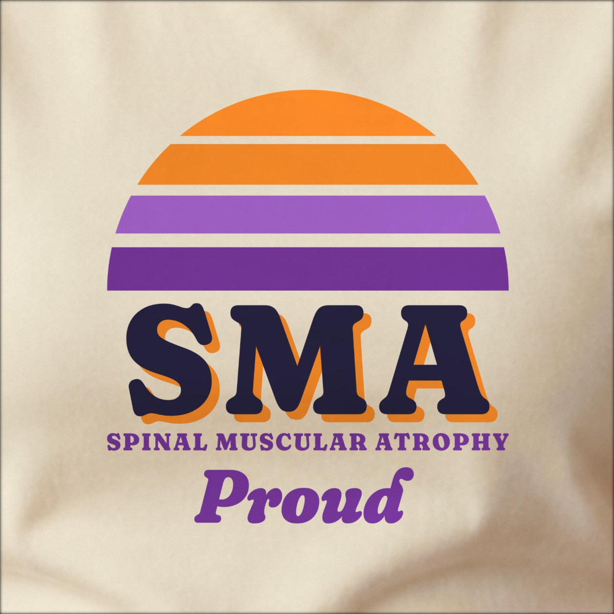 Close-up of the print on a natural tee: a striped half-sun in orange and purple above bold SMA lettering, SPINAL MUSCULAR ATROPHY spelled out underneath, with “Proud” in script.